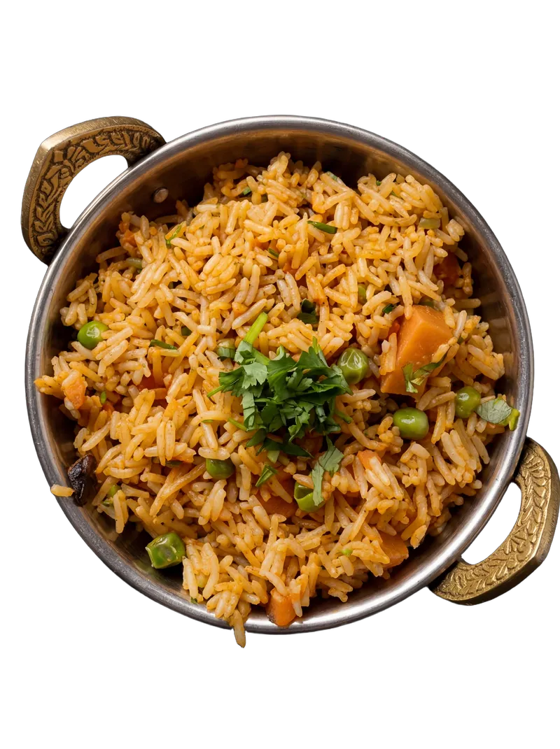 Layered biryani with saffron-tinted rice and tender meat in a steel handi