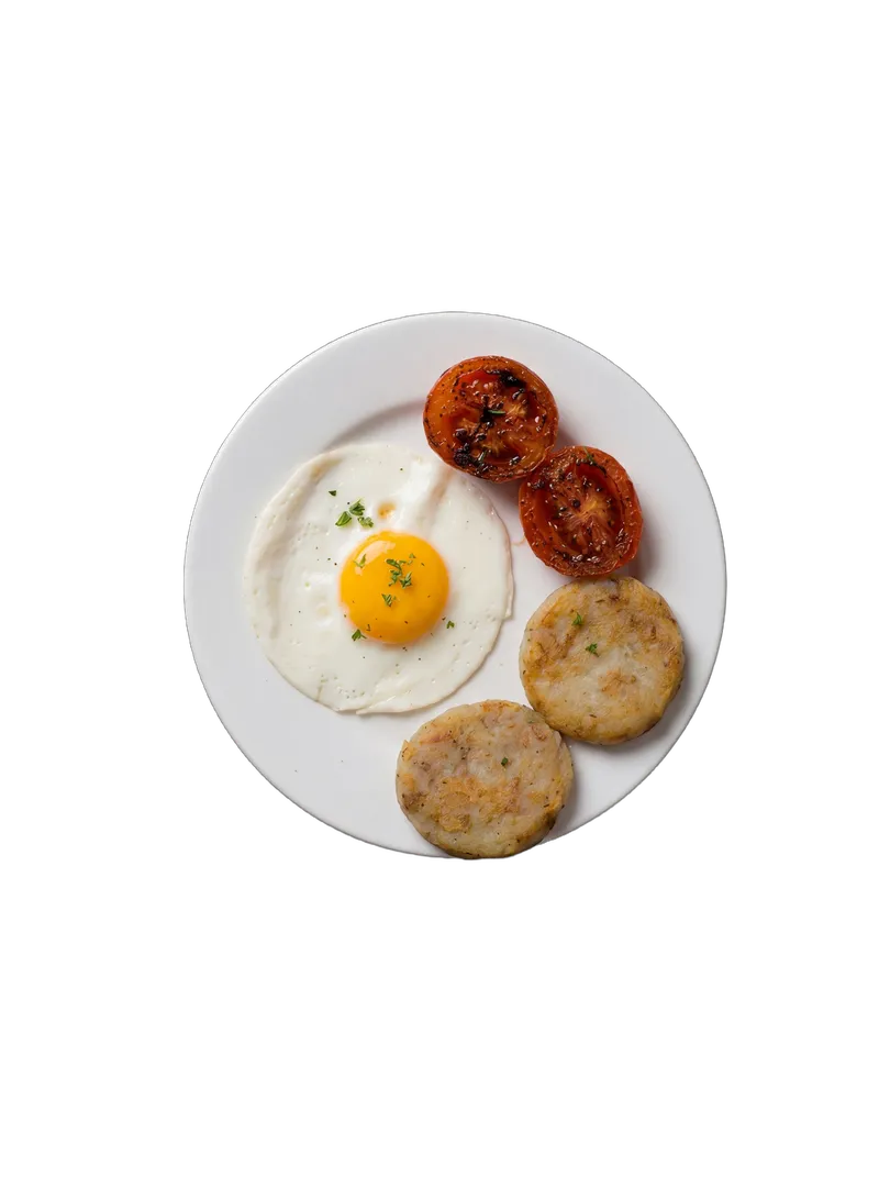 Continental breakfast plate with eggs, hash browns, and toast