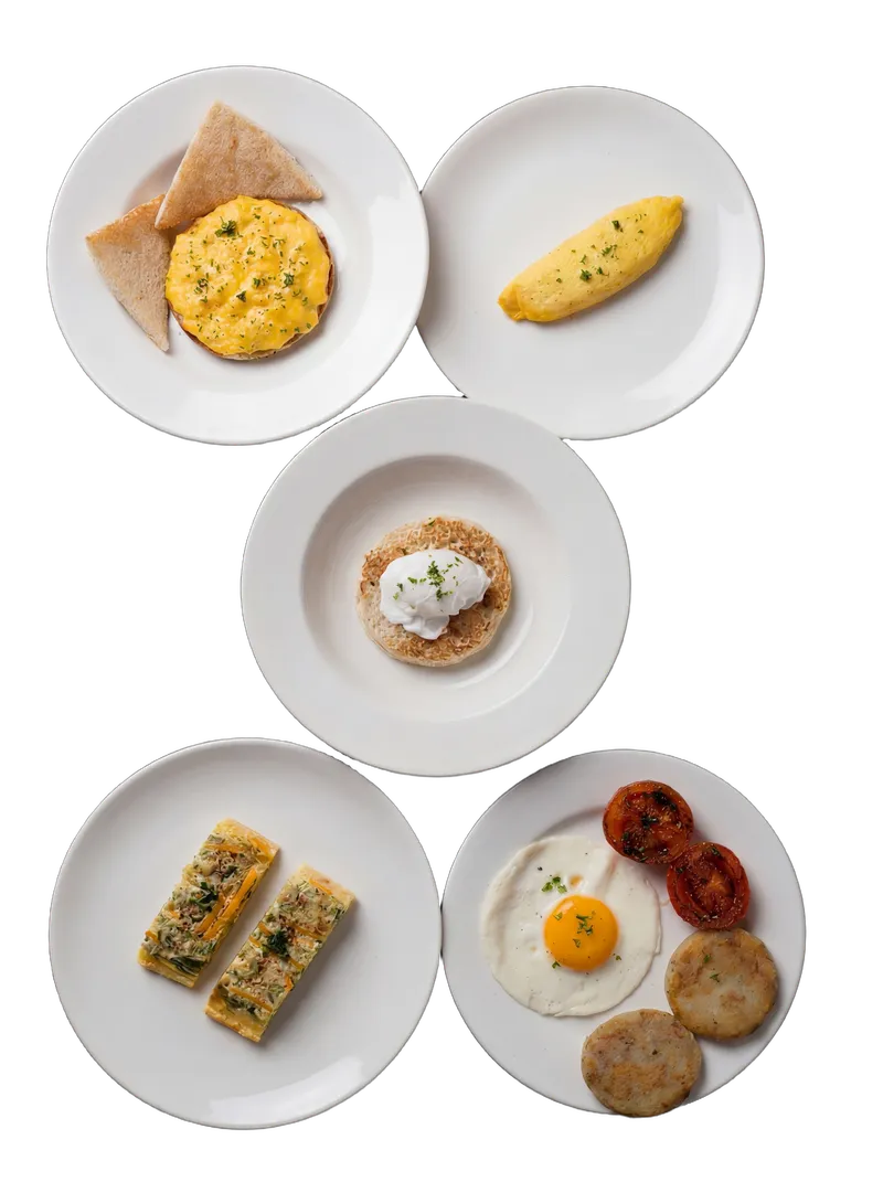 Continental breakfast spread with pastries, fruit, and hot dishes