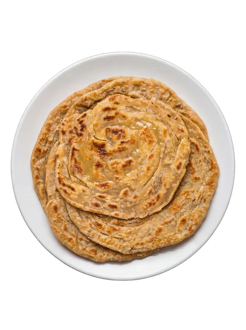 Single stacked layered laccha paratha on a white plate with char marks
