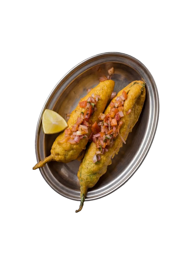 Mirchi bajji — stuffed green chillies deep-fried in gram flour batter